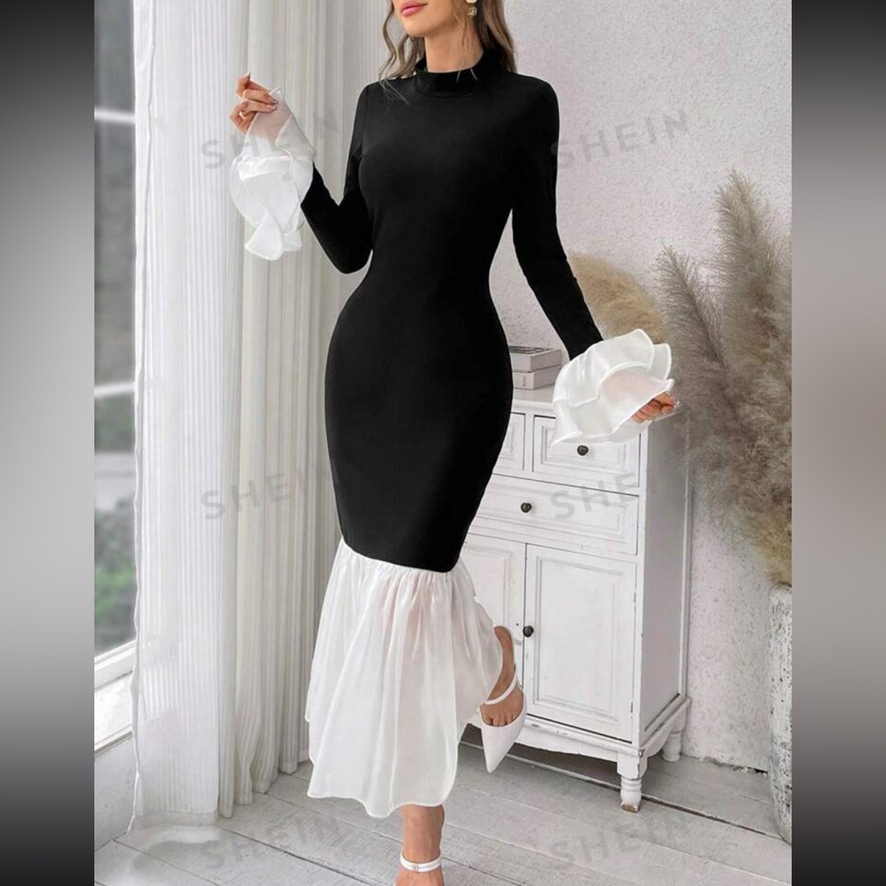 Black dress with tulle sleeves and bottom